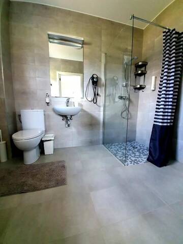 Фото номера Двухместный номер с 1 кроватью, вид на сад Гостевой дом Guest House Skrablas г. Rucava 4